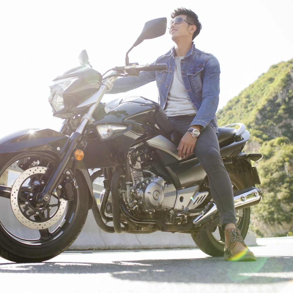 Young man riding motorcycle